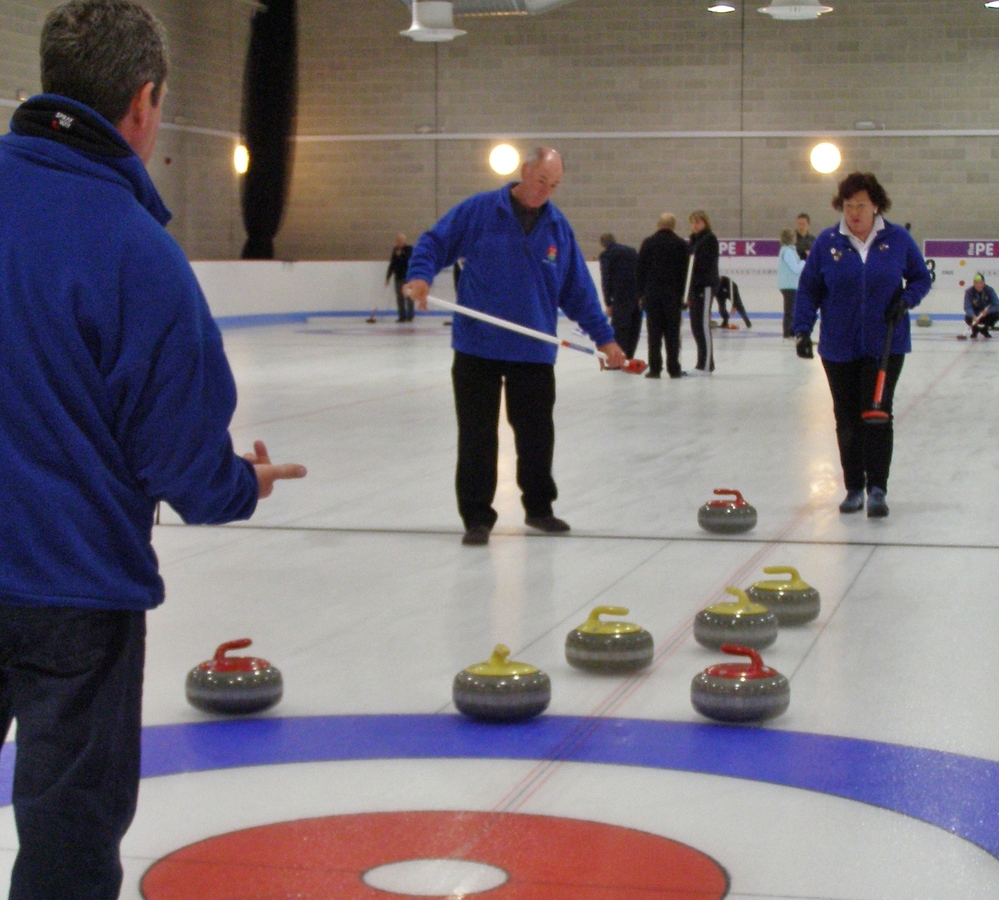 Don coaxes the stone into the house